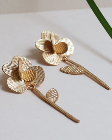 pendientes flor dorados