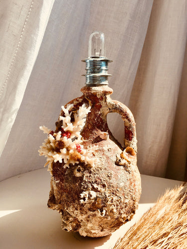 Terracotta lamp made with aged amphora with marine life