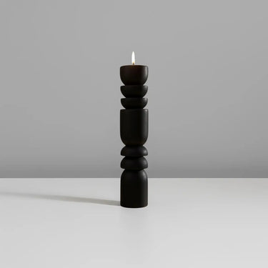Portavelas negros de madera africanos
