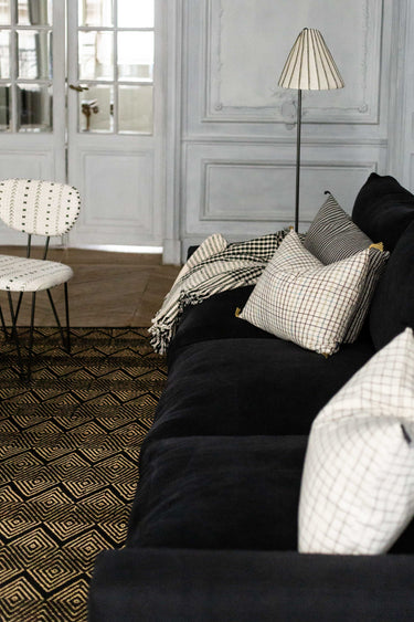 Housse de coussin en coton pour un salon noir et blanc