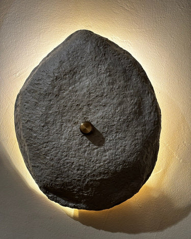 Organically shaped ceramic wall sconces "Piedra"