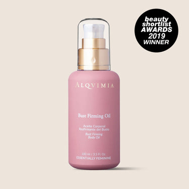 Aceite Bust Firming de Alqvimia de 100 ml sobre fondo beige, con sello Beauty Shortlist Awards 2019 Winner.