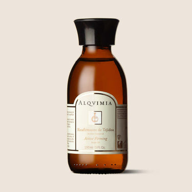 Aceite corporal Reafirmante de Tejidos de Alqvimia de 150 ml, en frasco ámbar sobre fondo beige.