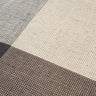 Detalle de la alfombra Bologna de lana y lino gris de Linie Design