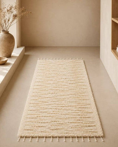 Alfombra de algodón con diseño de rayas y flecos
