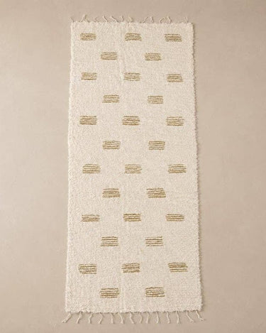 Alfombra de algodón con diseño de bloques y flecos