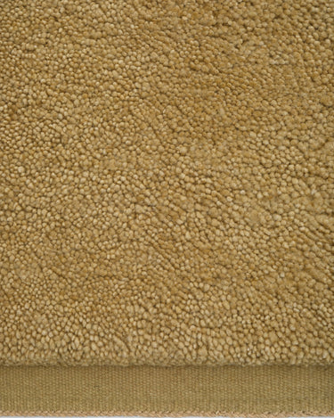Tactura Nest rugs by Linie Design: close-up of the yellow wool texture