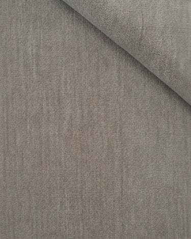 Sand wool rug with linen fringes by Linie Design, detail of the folded weave