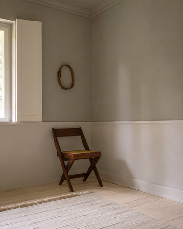 Tidal Waves rugs by Linie Design: beside a wooden chair