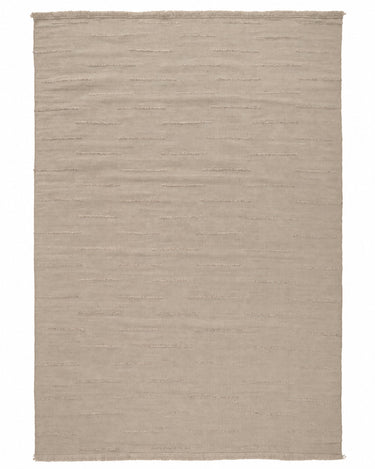 Beige wool rug with wavy lines by Linie Design, full view of the beige rug