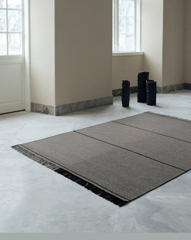 Alfombra Mindful Soul de lana piedra y gris Linie Design