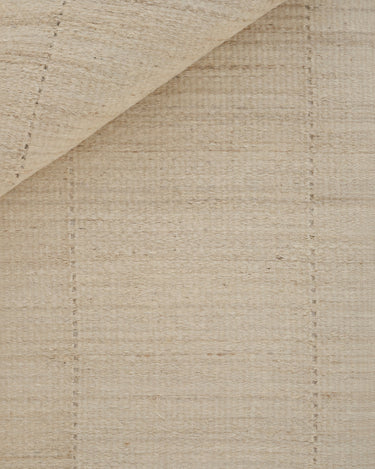 Cream jute rug with an open weave by Linie Design, close view of the open weave