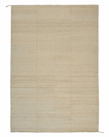 Cream jute rug with an open weave by Linie Design, full view of the cream rug