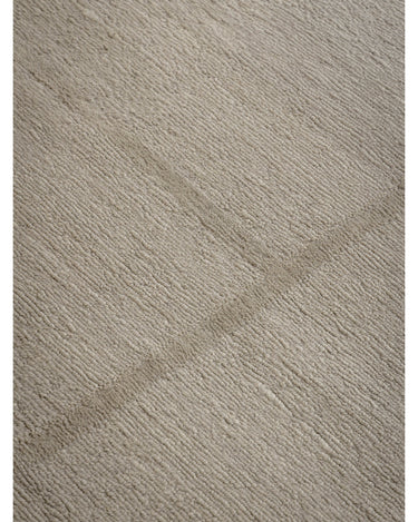 Alfombra de lana arena con líneas entrecruzadas de Linie Design: detalle de las líneas entrecruzadas.
