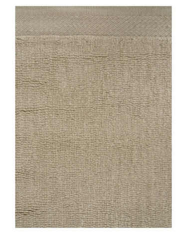 Alfombra de lana beige con bordes en contraste de Linie Design: detalle de la superficie y la línea lateral.