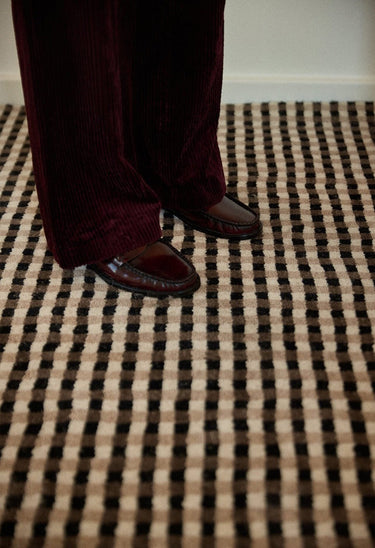 Alfombras de Gabrielle Paris, proporción y material de alfombra de lana damero