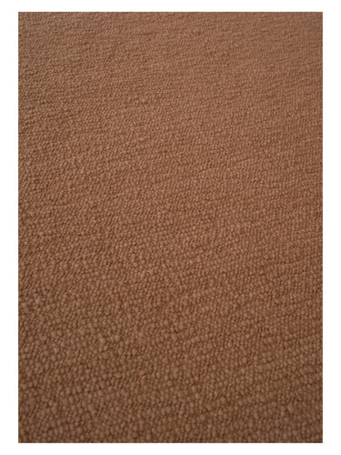 Alfombra de lana texturada Pebbled Poem de Linie Design, terracota, vista de la superficie texturada