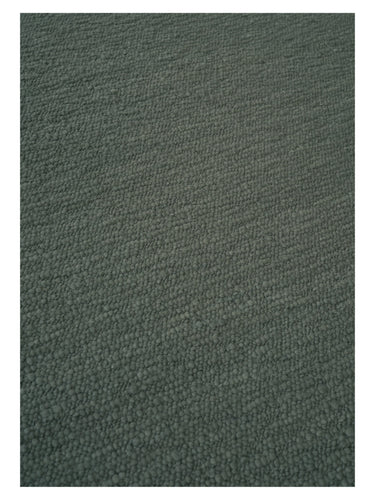 Alfombra de lana texturada Pebbled Poem de Linie Design, verde, trama vista en diagonal