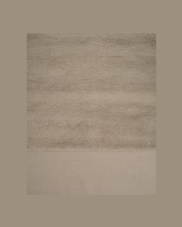 Alfombra de lana tono tiza con diseño de ojo eterno en relieve Eternal Eye Linie Design