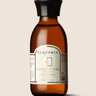 Aceite corporal Reafirmante de Tejidos de Alqvimia de 150 ml, en frasco ámbar sobre fondo beige.