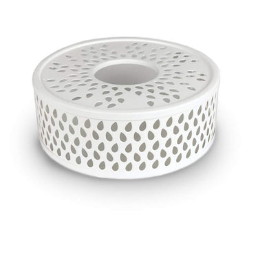 Calentador blanco de acero para tetera de Creano, detalle de la superficie circular perforada