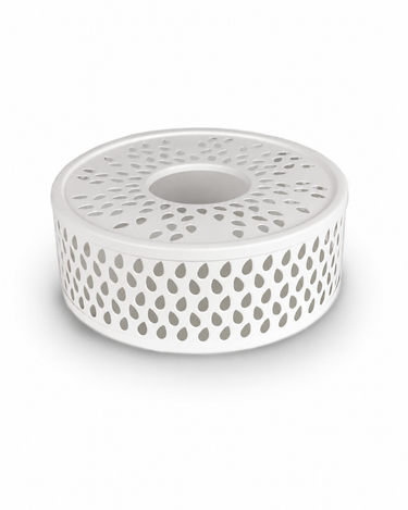 Calentador blanco de acero para tetera de Creano, con perforaciones decorativas y hueco central