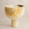 Centro de mesa de marfil de Vical sobre fondo topo claro