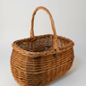 Cesta ovalada de mimbre buff hecha a mano 38x30 cm