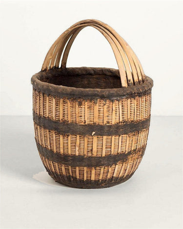 Cesto antiguo de mimbre con asa