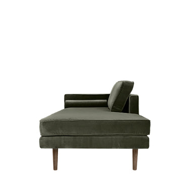 Detalle del respaldo y el reposabrazos de la chaise longue verde hoja