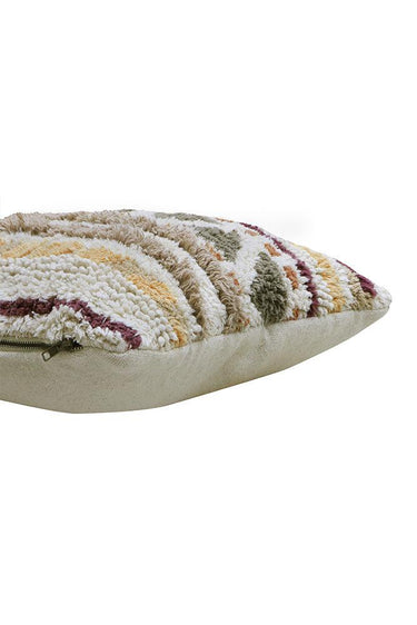 Cojín de algodón multicolor en ambiente de salón