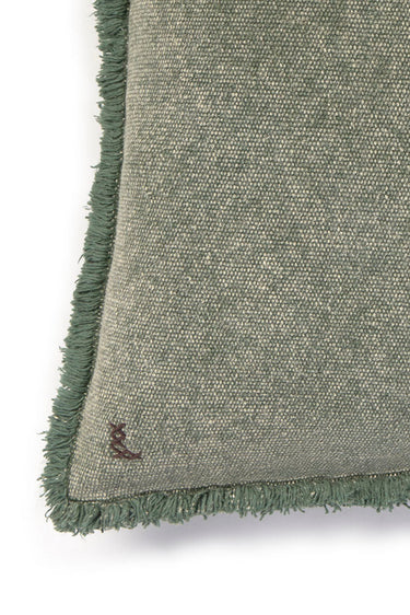 Detalle del tejido de algodón verde pato lavado a la piedra