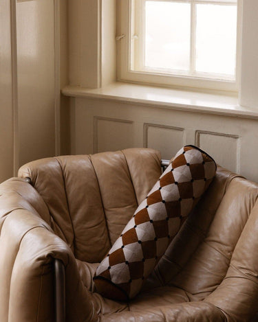Esmeralda yellow bolster cushion in 100% cotton with a printed design