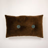 Brown buttoned decorative cushion by Olsson & Jensen