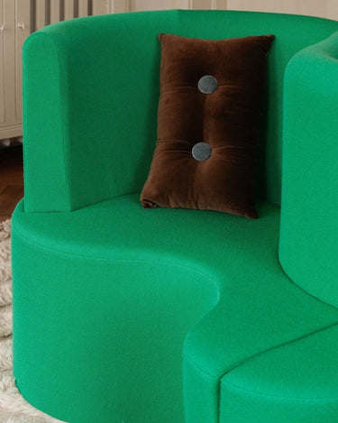 Detail of the front buttons on the brown decorative cushion