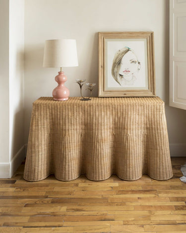Large natural rattan console with a wavy edge