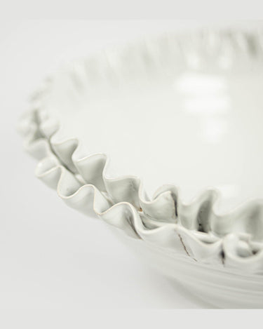Detail of a handmade white ceramic decorative bowl
