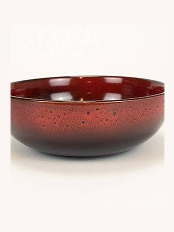 Composición de mesa con cuatro cuencos de cerámica esmaltada