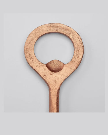 Abridor TUTUPI de acero inoxidable para mesa