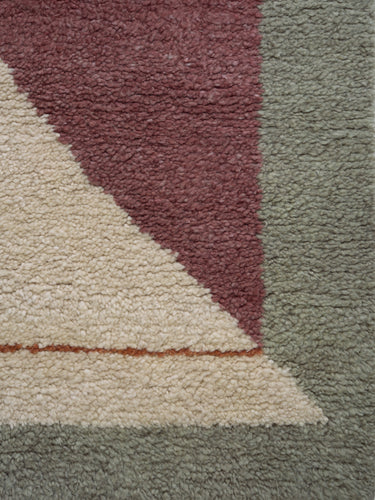 Detalle del tejido y del borde verde de la alfombra Optical Echo