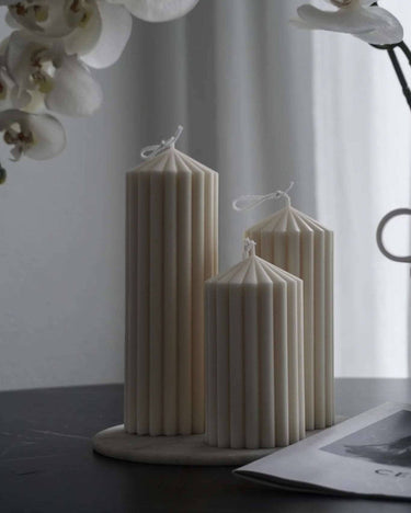 Detalle de vela decorativa perfumada aroma cítrico