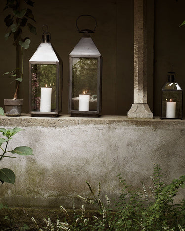 Tall oxidized brass lantern by Tine K Home