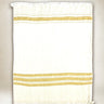 Fouta de playa Libeco de lino con raya mostaza