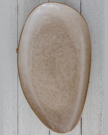 Pieza beige original para servir