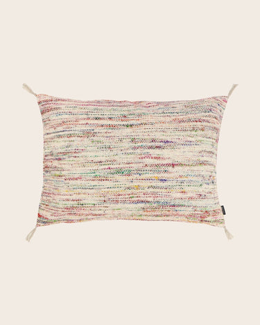 Detail of the Caravane cushion cover with multicolored pompoms