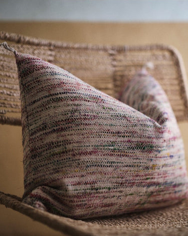 Caravane cotton and silk cushion cover in an interior setting