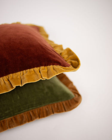 Fundas de cojín de cuadros: verde y camel delante, óxido y amarillo pálido detrás