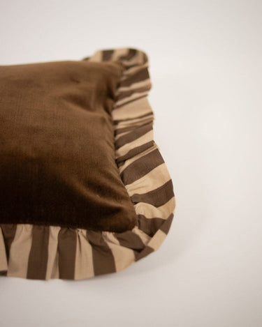 Detail of the striped ruffle on the brown cushion cover