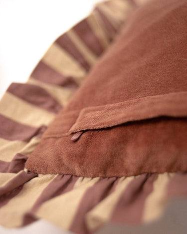 Detail of the gathered ruffle on the pink cushion cover