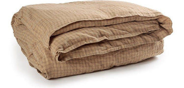 Funda nórdica lino lavado cuadros sobre cama Le Monde Sauvage